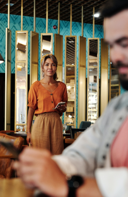 Woman and man meeting in a bar
